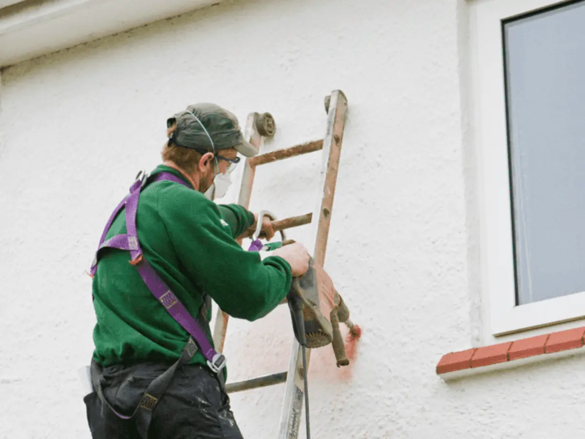 Cavity wall insulation being installed at a residential property in Scotland
